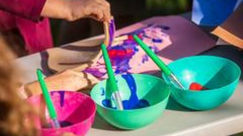 Paints in bowls on a table